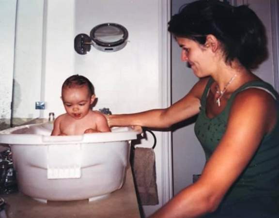 Angie Harmon bathing Finley Faith Sehorn